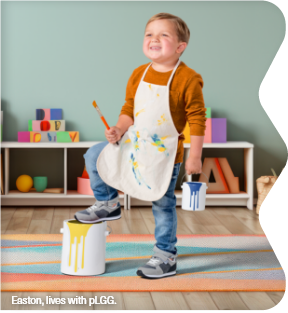 Easton, lives with pLGG, holding a paint can