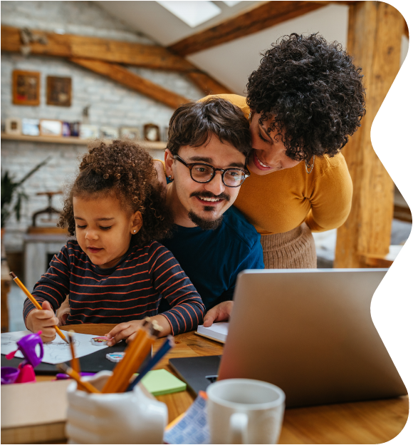 Family with child around a computer